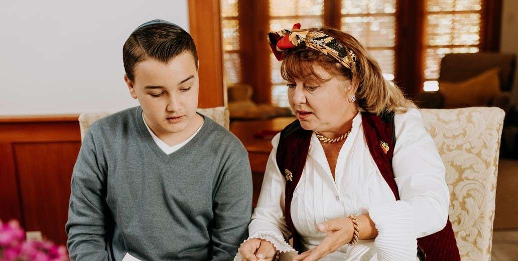 mother discussing with her son