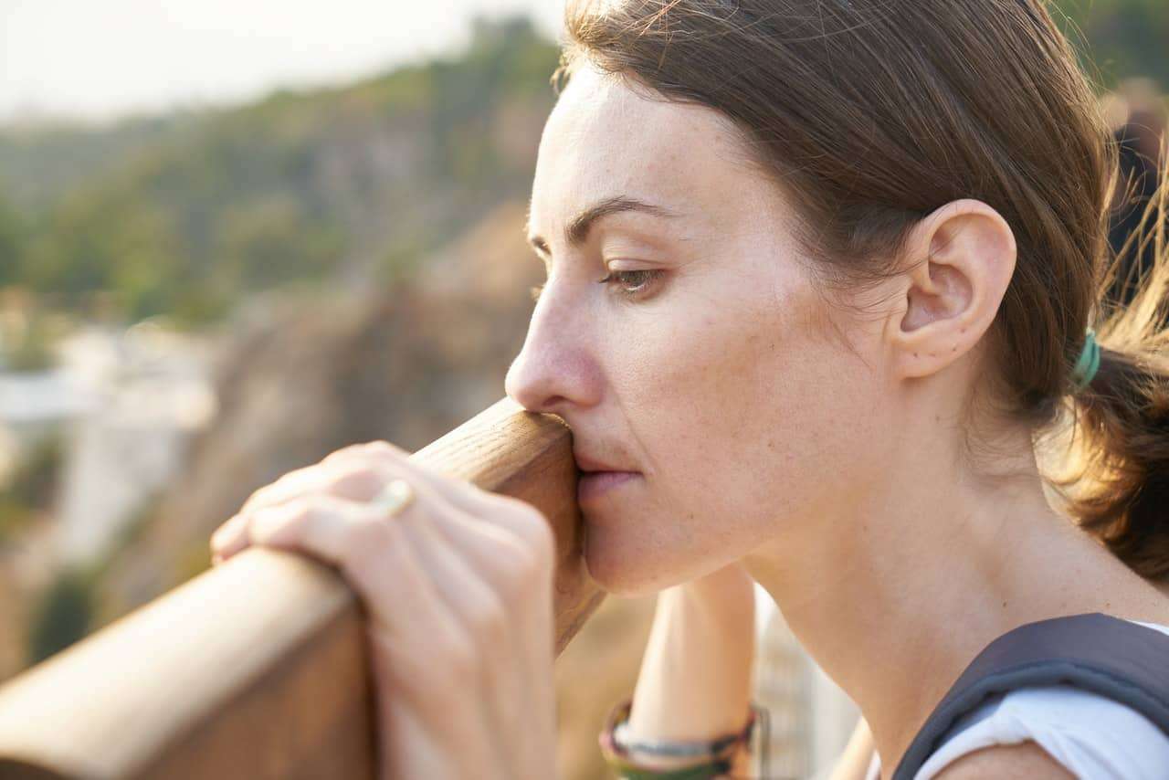 woman feeling guilty of divorce and facially sad